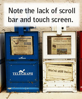 Note the lack of scroll bar or touchscreen on these old newspaper dispensers.